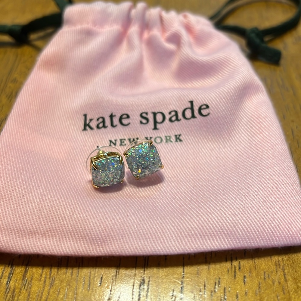 Kate spade glitter studs with gold trim. Never used comes with dust bag.